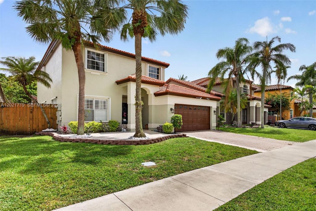 Photo of 4940 NW 54th St, Coconut Creek, FL 33073 (MLS # A12021719)
