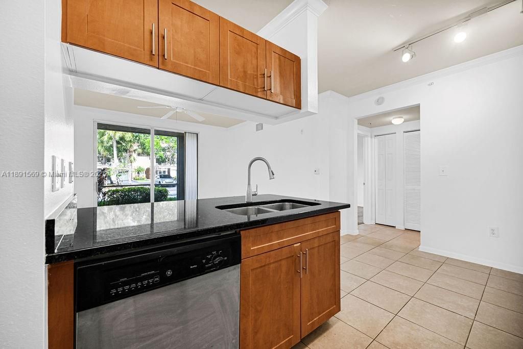 Photo of 6565 Emerald Dunes Dr #103 + GARAGE, West Palm Beach, FL 33411 (MLS # A11891569)