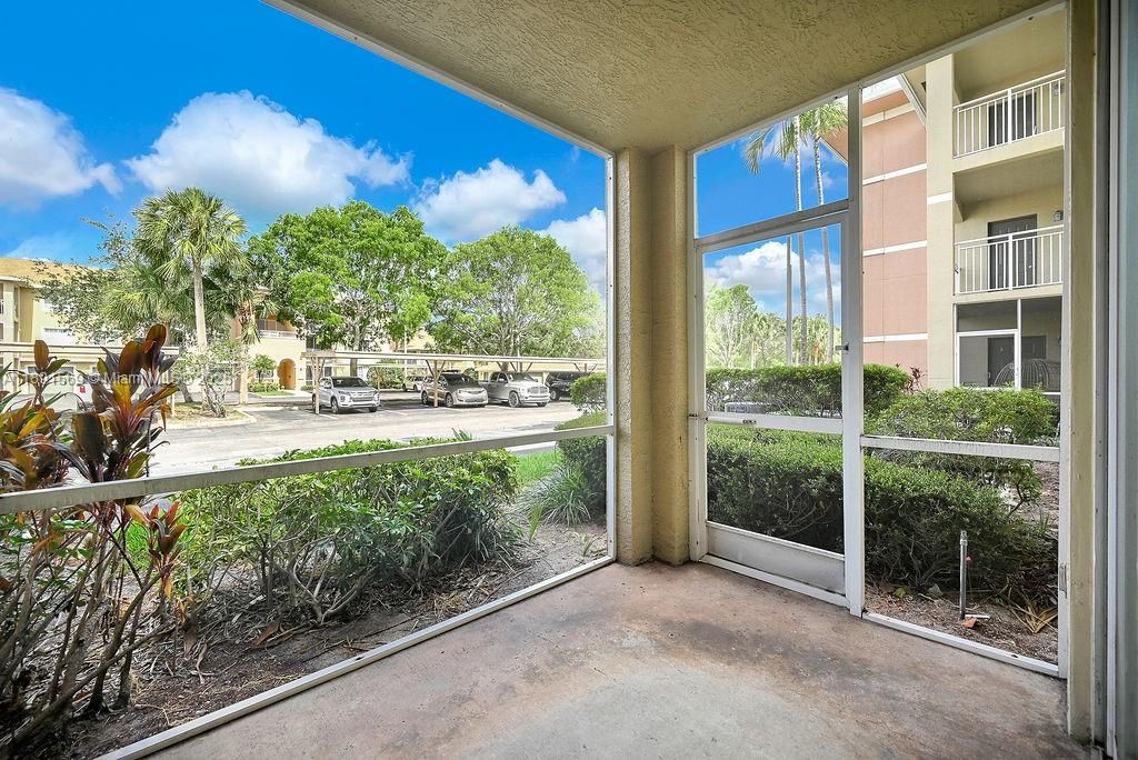 Photo of 6565 Emerald Dunes Dr #103 + GARAGE, West Palm Beach, FL 33411 (MLS # A11891569)