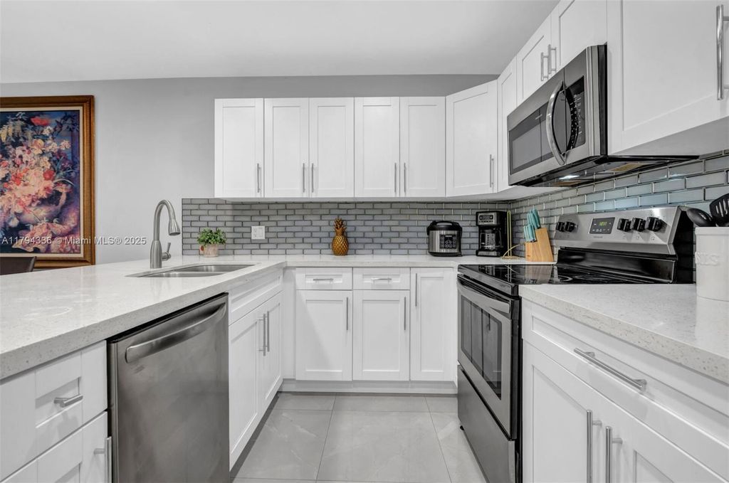 Photo of 11320 NW 35th Ct #A, Coral Springs, FL 33065 (MLS # A11794336)