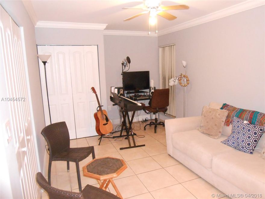 WALK TO BARRY U. FROM THIS TOTALLY RENOVATED CONDO. SPECTACULAR KITCHEN WITH TOP LINE APPLIANCES. VERY SPACIOUS LIVING/DINING ROOM WITH SLIDING GLASS DOORS TO BALCONY. CENTRAL A/C. NEW TANKLESS WATER HEATER. SECOND BEDROOM IS CURRENTLY CONFIGURED AS A DEN/OFFICE WITH CLOSET BUT EASILY CONVERTS TO FULL BEDROOM. COMMUNITY FEATURES TENNIS COURTS, POOL, GYM AND ON-SITE MANAGEMENT OFFICE.