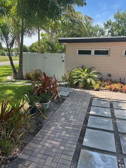 Experience modern coastal living in this remodeled 1-bedroom 1-bath apartment nestled in the desirable Lauder Gate Isles community of East Fort Lauderdale. Just minutes from vibrant restaurants, boutique shopping, the beach, this pet-friendly residence offers both comfort & convenience. Inside, enjoy spacious open-concept layout with updated finishes, stainless steel appliances & sleek countertops. Large Private Backyard. New Washer & Dryer in the unit. Pets Welcome. Lush landscaping. Easy access to waterfront activities and a walkable neighborhood vibe, this apartment is perfect for those seeking a relaxed yet connected lifestyle in one of Fort Lauderdale’s most sought-after areas. Quick Approval.