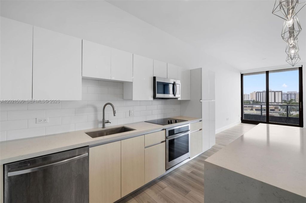 Photo of 101 Diplomat Pkwy #410, Hallandale Beach, FL 33009 (MLS # A12021590)