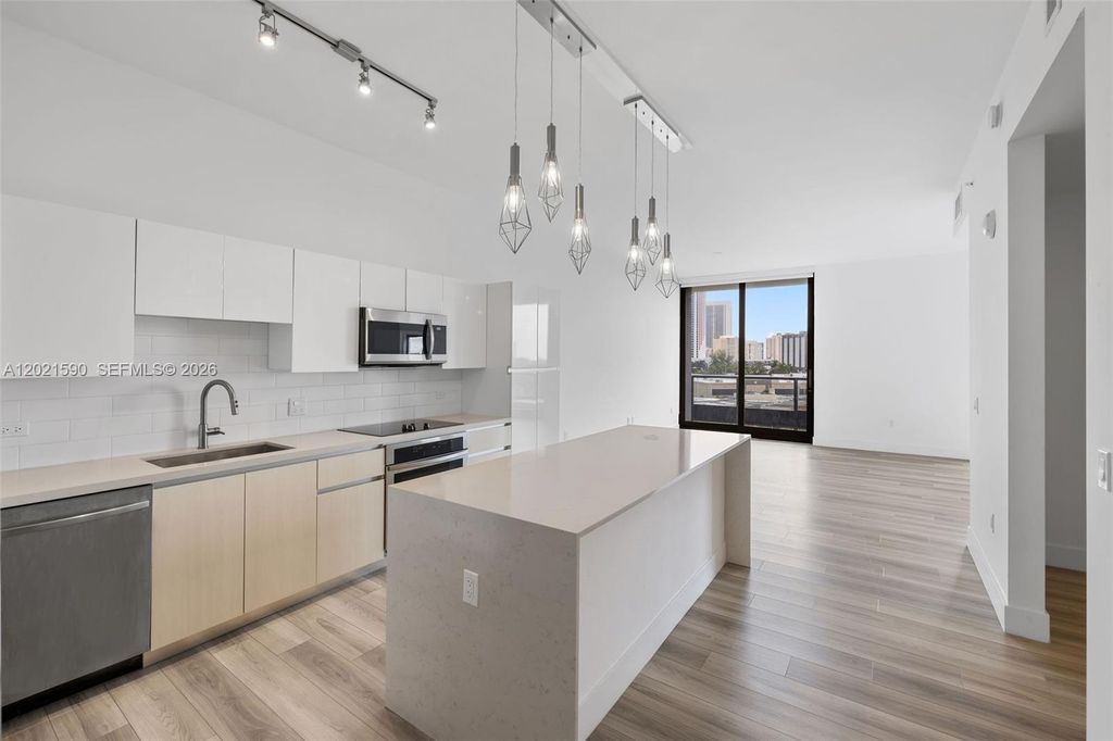 Photo of 101 Diplomat Pkwy #410, Hallandale Beach, FL 33009 (MLS # A12021590)