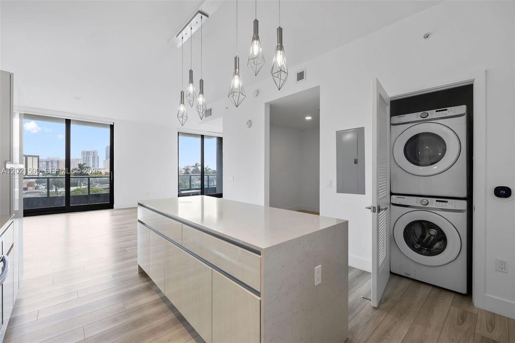 Photo of 101 Diplomat Pkwy #410, Hallandale Beach, FL 33009 (MLS # A12021590)