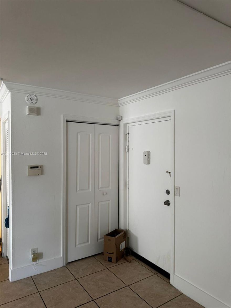 Ground-level unit with private entrance from the parking lot. in the heart of Lauderhill, conveniently located next to 441 and between I95 and Turnpike. 2 Closets on the Master bedroom a regular one and a walking closet. Water-resistant laminate, and tile. Secured lobby. Community pool. NO LEASING