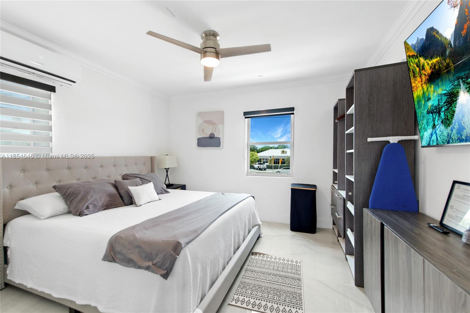 Discover this fully furnished and equipped apartment, ready for you to move in. Located at Mile Marker 98 in Tavernier, this unit offers an unbeatable location with direct exposure on the Overseas Highway. The building recently underwent over $100,000 in furnitures, including brand-new appliances and top on the line equipment in each unit. The building is a hub of activity, with popular businesses like a hair and nail salon, a pizzeria, and a doctor's office. A food truck and ice cream shop are also coming soon, attracting plenty of foot and car traffic.