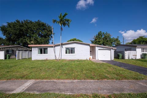 Photo of 220 SW 65th Ave, Pembroke Pines, FL 33023 (MLS # A12058792)