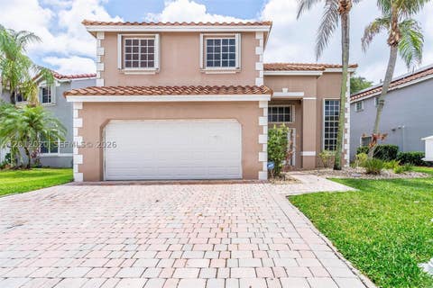 Photo of 303 Bridgeton Rd, Weston, FL 33326 (MLS # A12012020)