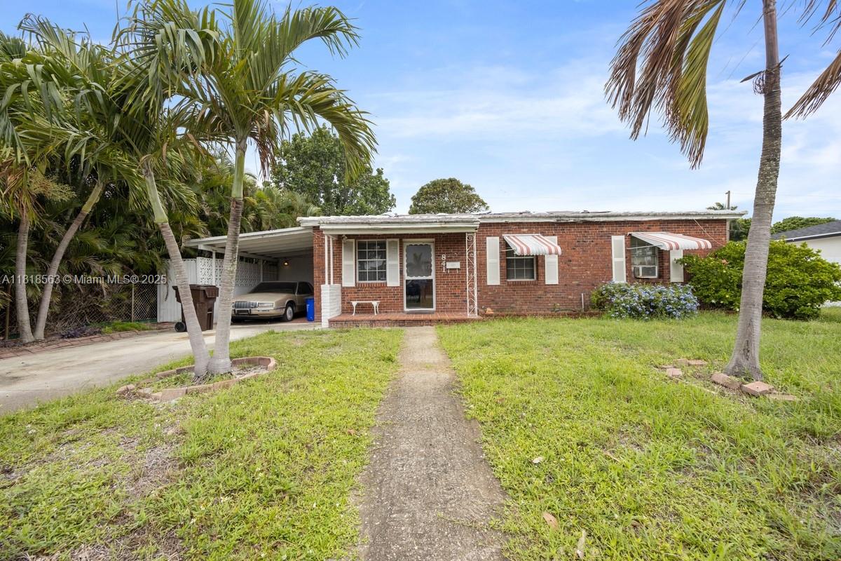 Well-established neighborhood of West Palm Beach, this charming 4-bedroom, 2-bathroom concrete block home offers 1,490 square feet of comfortable living space, complete with a convenient 1-car carport. Just a short 10-minute drive to Mar-a-Lago, PBI Airport, downtown West Palm Beach, Palm Beach Island, and pristine beaches, this property presents an excellent opportunity. With a touch of creativity and some TLC, it can be transformed into the ideal vacation getaway or a cozy primary residence. Priced competitively—don’t miss your chance to make it yours!