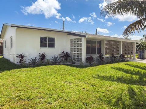 Photo of 1630 NE 34th Ct, Pompano Beach, FL 33064 (MLS # A11853510)