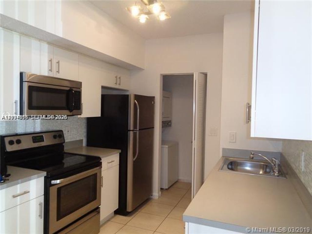 Photo of 3271 Sabal Palm Mnr #103, Davie, FL 33024 (MLS # A12024698)