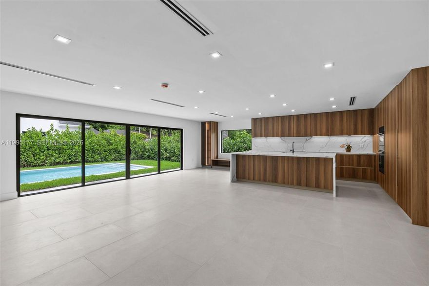 Immaculate, 2026 new expansion and rebuilt custom 3,360 sft home w/ incredible upgrades and workmanship on a quiet South Miami street east of US1. Featuring a split design with 4 beds & 3.5 luxurious baths, new pool and 2 car garage on a massive 10,800 rectangular lot on sewer w/ underground electrical connection.  A private master suite open to the backyard, with a cavernous walk in closet, and luxurious bath and hall area. 100% new hurricane impact windows and doors, total electrical system, 2 zone AC/ HVAC ducts and vents, roof, roof strapping, appliances, plumbing, water collection system will all add years of worry-free living. A stylish Italkraft kitchen, all new custom closets, flooring, LED lights and doors add function and great accents to this house. On flood zone X.
 Close to all of Miami’s top private schools, Univ. of Miami, Whole Foods, Fresh Market, gyms, tennis, and dozens of incredible restaurants and parks.  Come see this home today and benefit from living close to all of the amazing developments coming to downtown South Miami.