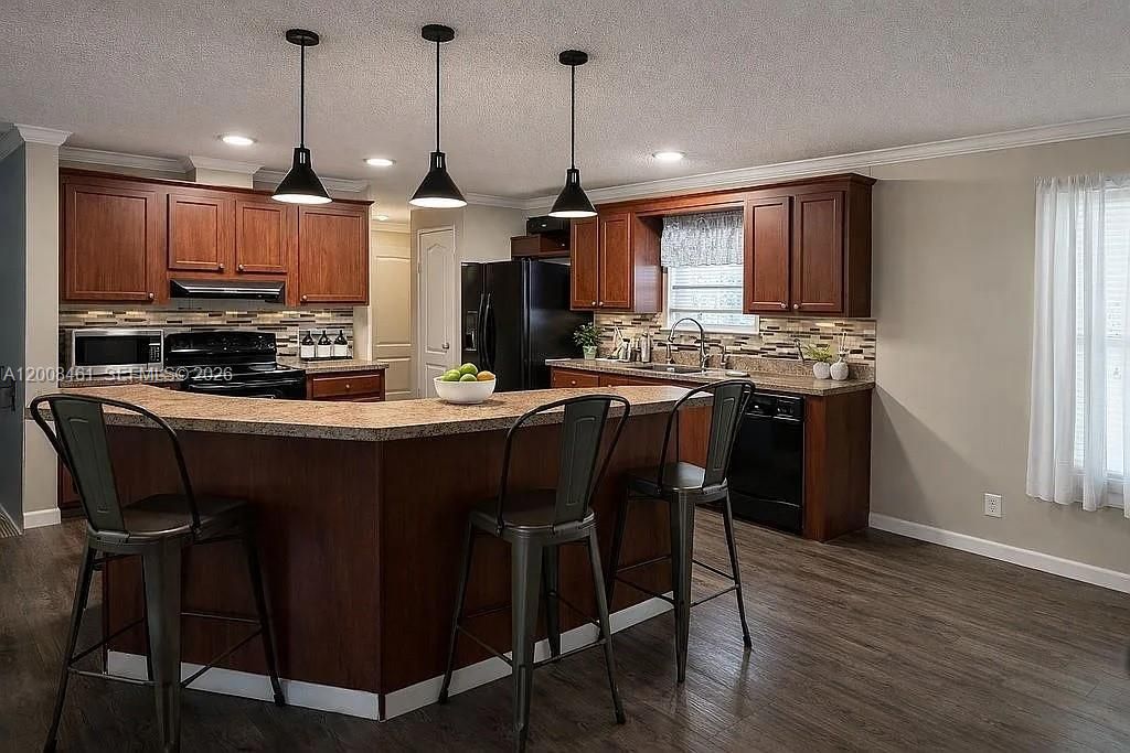 Photo of 390 NW 134th Ave, Plantation, FL 33325 (MLS # A12008461)