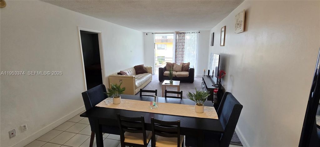 Photo of 1830 Dixieanna St #203, Hollywood, FL 33020 (MLS # A11953374)