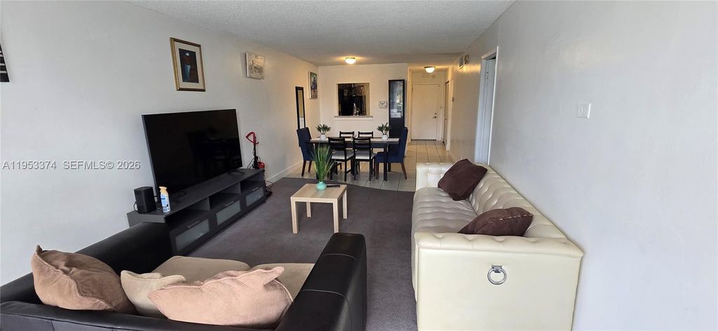 Photo of 1830 Dixieanna St #203, Hollywood, FL 33020 (MLS # A11953374)