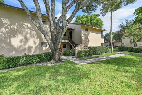 Photo of 3773 Cocoplum Cir #3575, Coconut Creek, FL 33063 (MLS # A11905022)