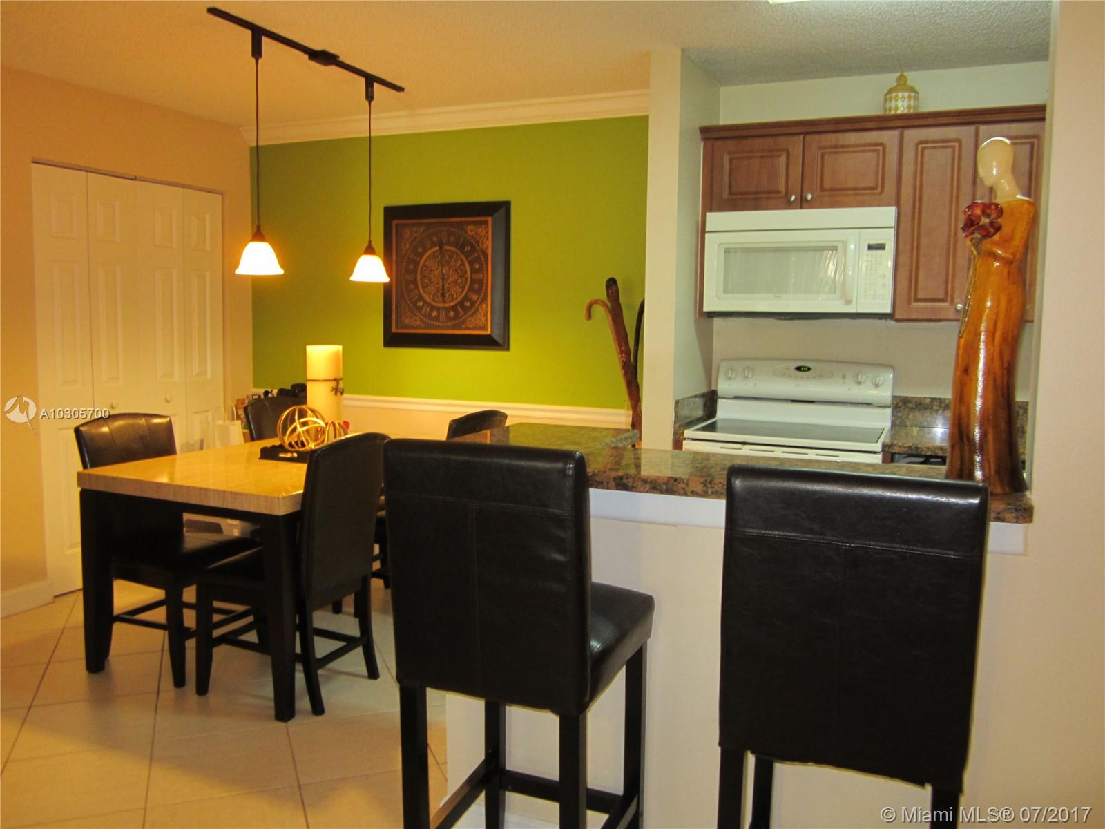 Beautifully updated condo in the heart of Plantation! Granite counter tops, quality cabinetry, tiled floors,ceiling fans. Large balcony with tranquil lake views. Lush landscaping. Resort style amenities, pool, club house, tanning deck,tennis, business center and more. Great location near highly rated schools.Just minutes from 595, Sawgrass Mills mall, walking distance to Central Park Elementary, Starbucks, Sunset Park, shopping, dining, & Chabad of Plantation.