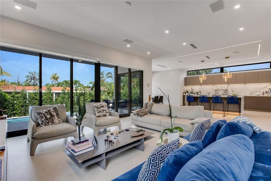 Welcome to your dream oasis! This beautiful 2024 construction 5-BR, 3.5-BA(room for 4th) home offers an exquisite blend of luxury and comfort across 3,108 SF. As you step inside, you'll be greeted by a grand foyer leading to spacious living areas adorned w/ hi-ceilings, tile flrs & recessed lighting.

The chef's kitchen is a culinary enthusiast's delight, featuring custom cabinetry made by Vendetta Cuccina, premium counters, Thermador appliances, 5 burner gas stove & a wine cooler. Hurricane impact windows & doors fill the space w/ natural light, showcasing views of your private, fenced yard w/ pool.

Each bedroom boasts custom closets & the primary suite includes an ensuite w/ separate shower & tub for ultimate relaxation. 2 sets of W/D's. Best new construction deal in Surfside!