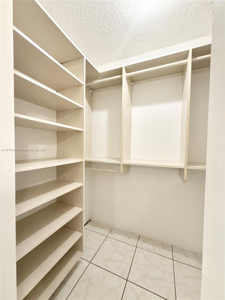 RACQUET CLUB APARTMENTS A - Residential Lease