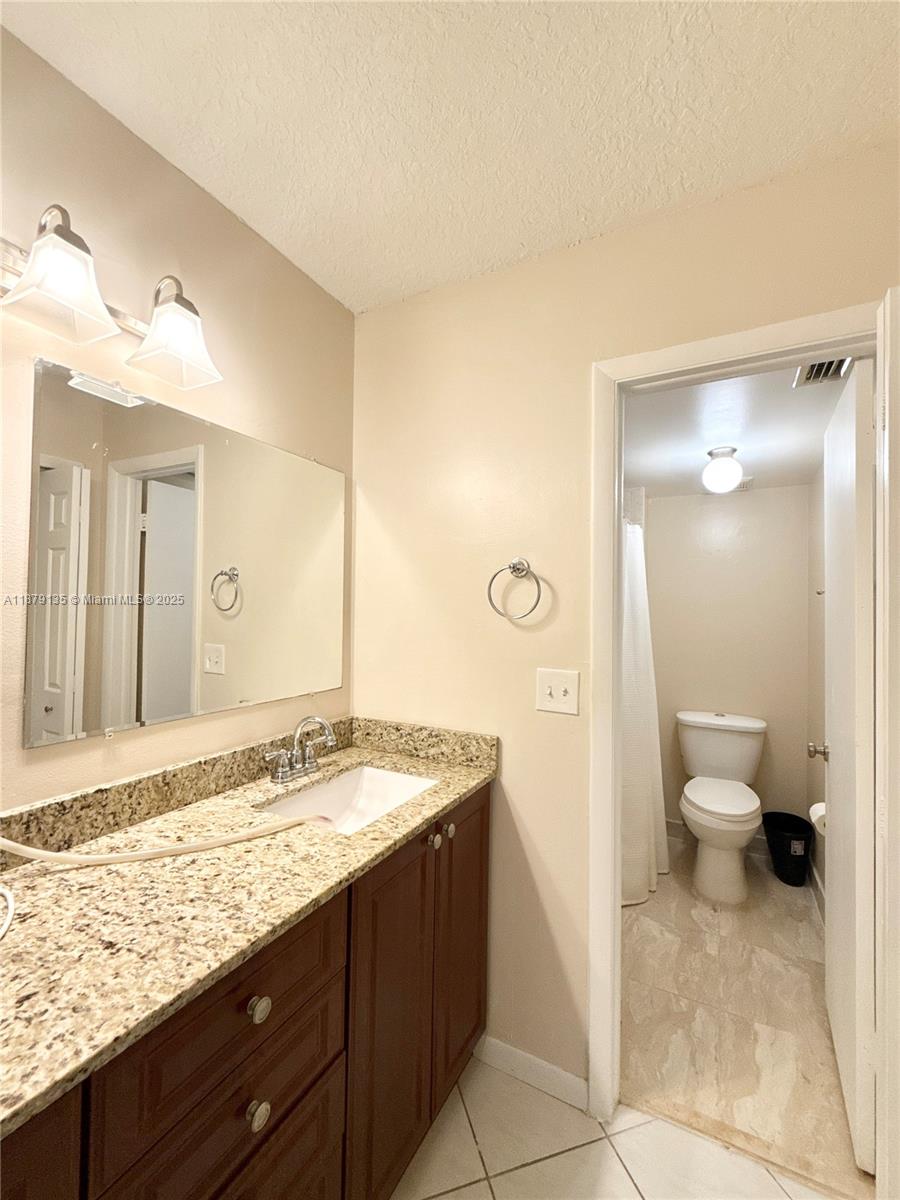 RACQUET CLUB APARTMENTS A - Residential Lease