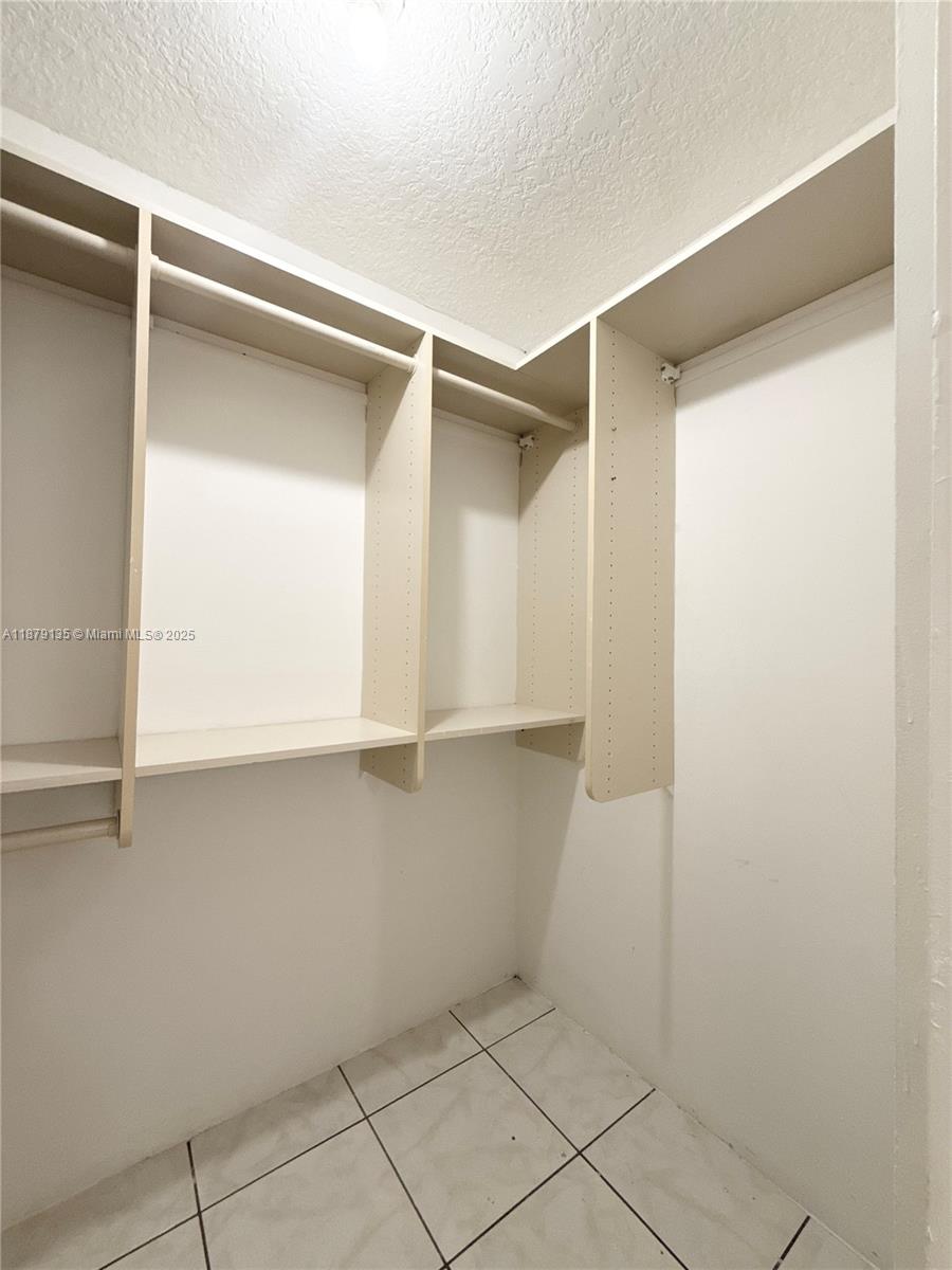 RACQUET CLUB APARTMENTS A - Residential Lease