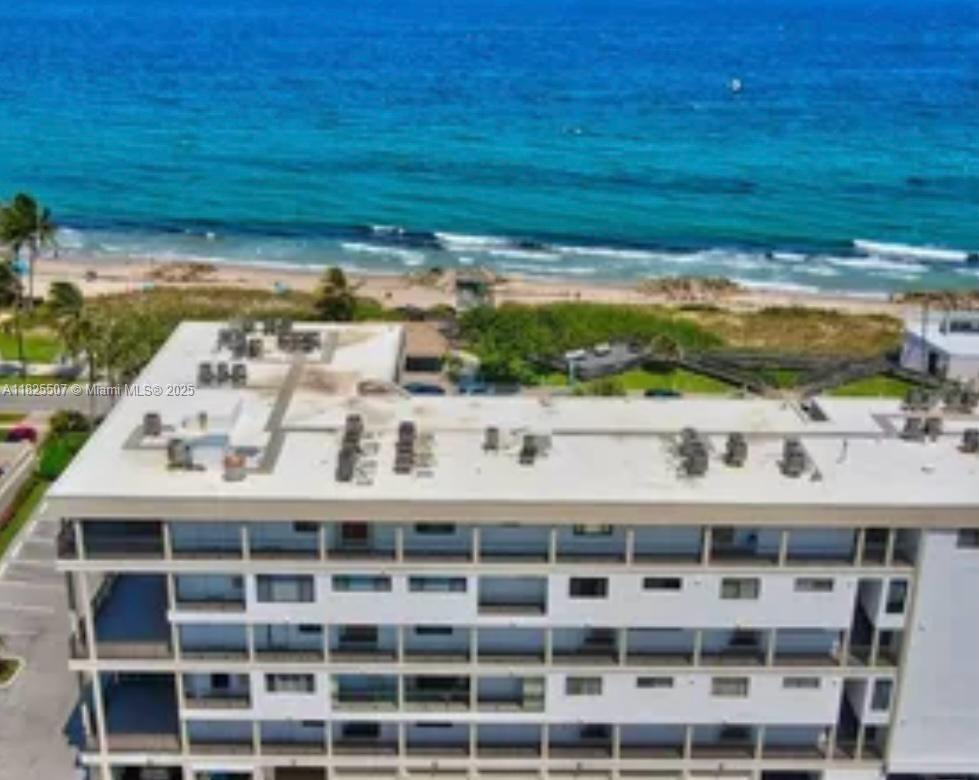 LOCATION! AMAZING TWO STORY OCEAN FRONT CONDO LOCATED DIRECTLY ACROSS THE STREET FROM DEERFIELD BEACH WITH ITS OWN PRIVATE ENTRANCE AND BALCONY WITH UNOBSTRUCTED VIEWS OF THE OCEAN AND THE BEACH. THIS 2 BED, 2.5 BATH UNIT IS TURN KEY. 32" BY 32" PORCELAIN TILE THROUGHTOUT. WOODEN KITCHEN CABINETS WITH STAINLESS STEEL APPLIANCES, ELECTRIC COOKTOP AND BUILT IN OVEN, GRANITE COUNTERTOP WITH WATERFALL. MATCHING GRANITE AND WOODEN CABINETS IN ALL BATHROOMS. 2 A/C UNITS, HEATED COMMUNITY POOL, BBQ AND BATHROOM. 2 ASSINGED PARKING SPACES AND ONE STORAGE ROOM. THE UNIT IS SOARING HIGH CEILINGS, CUSTOM PLANTATION SHUTTERS. FULL IMPACT WINDOWS AND MORE