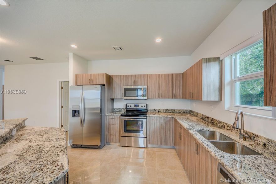 Gorgeous home in spectacular area! This 3 bedroom/2 bath New Construction home features high ceilings, premium finishes and high impact doors plus windows. Kitchen comes upgraded with custom European cabinets, granite counter tops, and spacious bar height breakfast area. Open floor plan with Porcelain tiles throughout and a high-efficiency A/C unit. Conveniently located near the beach, schools, shopping, dining, and Fort Lauderdale