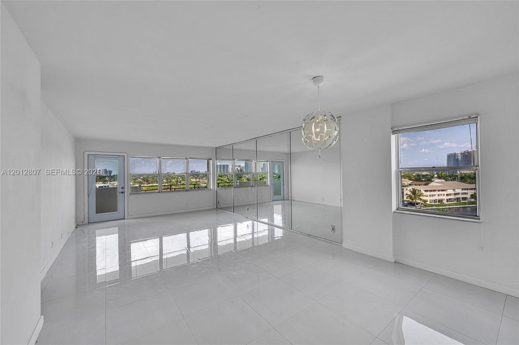 Photo of 401 Golden Isles Dr #712, Hallandale Beach, FL 33009 (MLS # A12012807)
