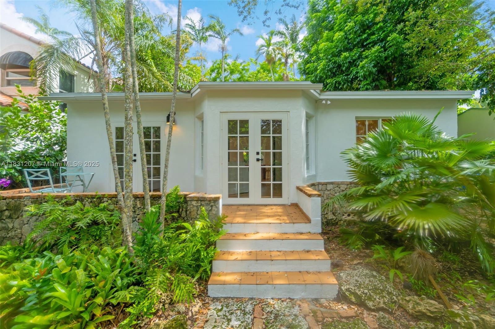 South Coconut Grove's prestigious street of El Prado! Instantly feel the distinctive charm of a space crafted for both comfort and character. With warm hardwood floors, ample natural light, and a seamless layout, the home exudes an inviting ambiance and undeniable allure. From the moment you arrive, you are enveloped in an environment that harmonizes tranquility with the vibrant energy of Coconut Grove. Set on a generous 5,800-square-foot lot surrounded by lush greenery, this treasure offers more than just a residence—it’s an unparalleled living experience. Featuring a new roof, air conditioning, kitchen, and appliances, this beautifully updated, completely furnished home ensures a smooth transition into your next chapter.
