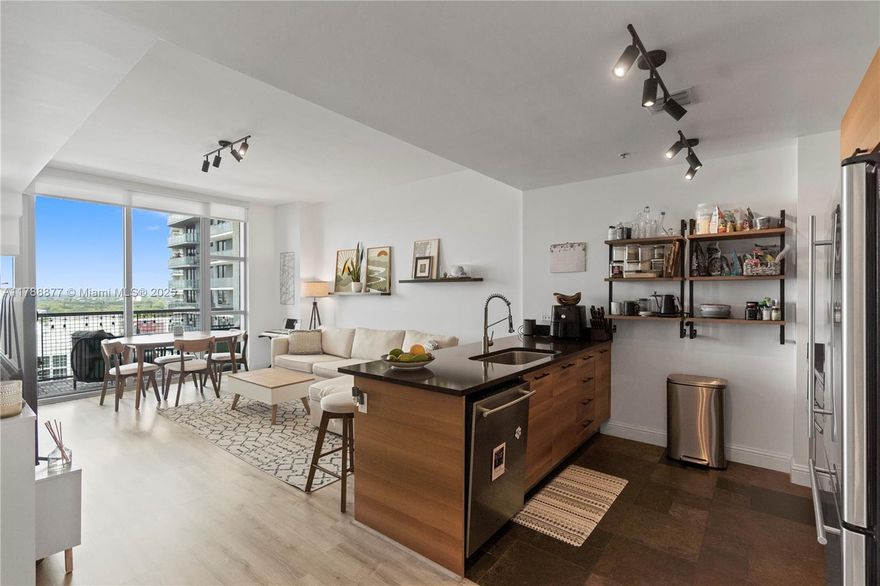 Welcome to your dream condo in vibrant Midtown Miami, one of the city's most walkable and desirable neighborhoods to live in! This beautifully upgraded 1 bed, 1.5 bath unit features floor-to-ceiling windows bringing abundant natural light, and a spacious balcony with north-facing and partial intracoastal views. The large primary bedroom has balcony access, a luxurious en-suite bath with an oversized shower, and a new walk-in closet. Additional upgrades include a new washer/dryer and vinyl flooring (2023). 
4 Midtown offers resort-style amenities: a very large pool overlooking the bay, two BBQ areas, fully equipped gym, yoga room, co-working space, and 24/7 security—all steps from Design District, Wynwood, Trader Joe’s, and top shopping & dining. Everything you need is walking distance!