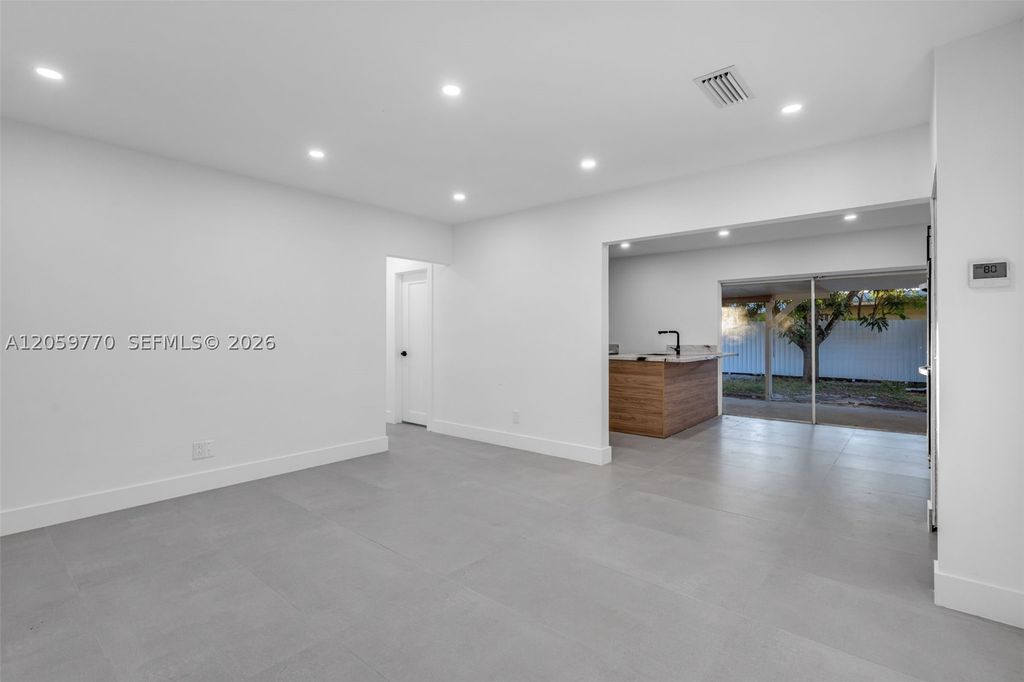Photo of 730 NW 77th Way, Pembroke Pines, FL 33024 (MLS # A12059770)