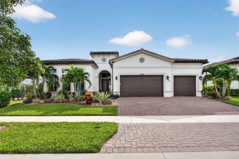 Photo of 7848 Liberty Way, Parkland, FL 33067 (MLS # A12066863)