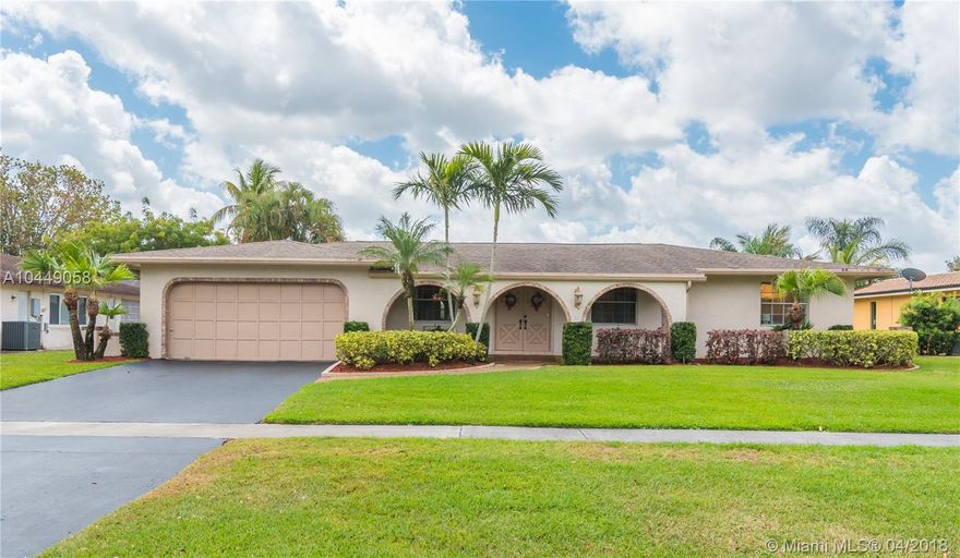 SPACIOUS RANCH STYLE WATERFRONT / POOL HOME IN THE HEART OF PLANTATION (ROYAL PALM SOUTH) IS NOW AVAILABLE.  FEATURES INCLUDE 4 BEDROOMS, 2 BATHROOMS, FORMAL LIVING ROOM, FORMAL DINING ROOM, SPACIOUS KITCHEN OPEN TO THE FAMILY ROOM WITH BREATHTAKING WATER VIEWS, TILE AND CARPET FLOORING THROUGHOUT, AN OVERSIZED FLORIDA ROOM WITH LOTS OF NATURAL LIGHTING, FREE FORM POOL, FENCED YARD, PRIVATE DOCK AND AN 85FT REINFORCED SEAWALL.  CLOSE TO ALL MAJOR HIGHWAYS, PARKS & TOP RATED SCHOOLS.