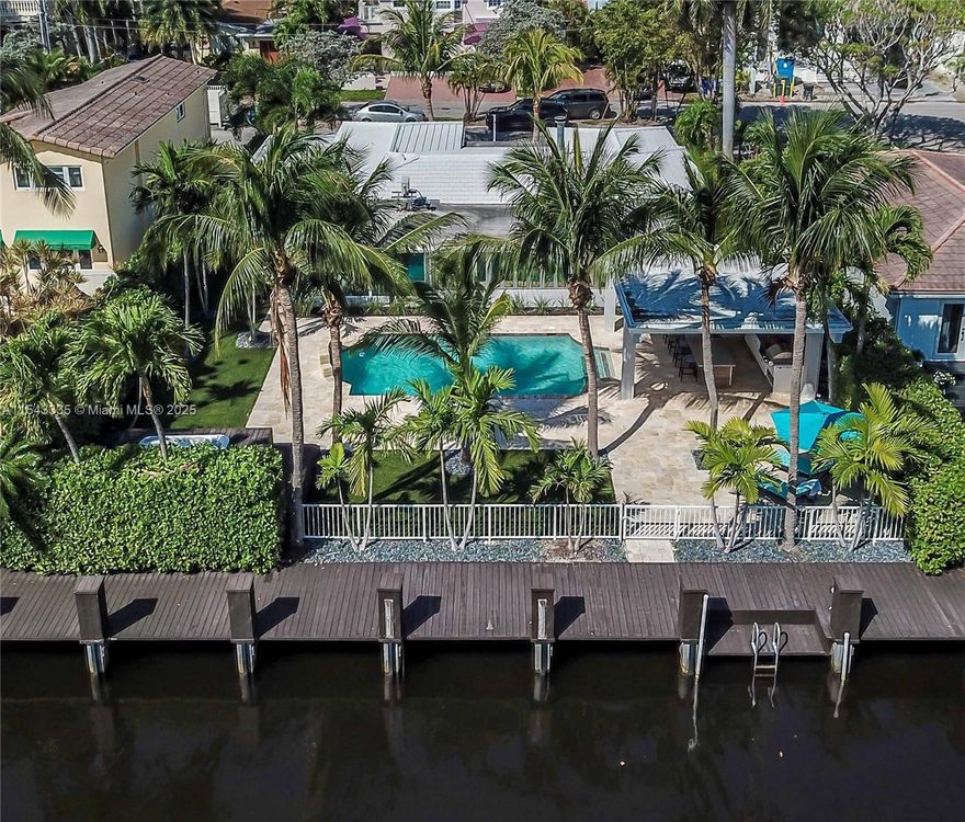 Best priced 75Ft waterfront paradise on Las Olas, in move-in condition! Also avail. furnished. Fully equipped dock w/power station (220V) on 90ft canal width. Fits 65Ft boat. No fixed bridges & just minutes to the Inlet. This 3 bedroom, 3 1/2 baths waterfront home is completely remodeled w/open floors, impact windows & doors, a fireplace & equipped w/ smart home system. Large master bedroom w/own seating/office area featuring electric shutters, large closet & built-in cabinetry. Spectacular summer kitchen built in 2014 overlooking the pool & water offers all amenities for outside entertainment w/ gas stove, Kamado ceramic grill, infrared grill & more. Pool w/fountain & hot tub and outside cabana bath for guests. A real deal as land value alone is $3Mio!