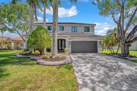 Photo of 731 Tulip Cir, Weston, FL 33327 (MLS # A12034584)