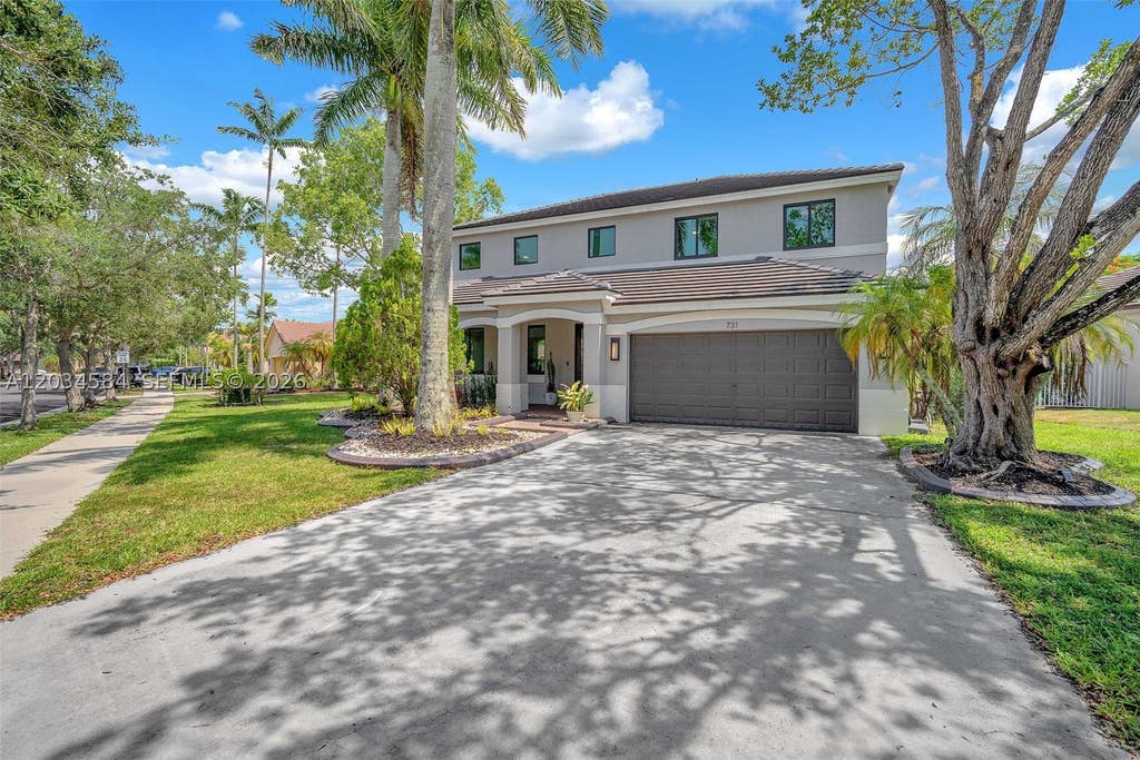 Photo of 731 Tulip Cir, Weston, FL 33327 (MLS # A12034584)