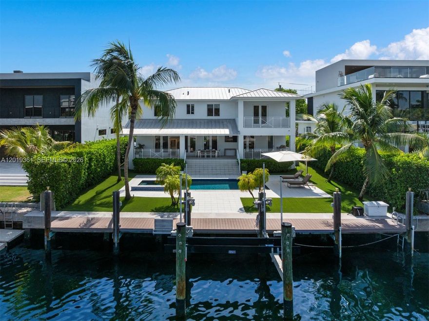 Beautifully designed Key West-style waterfront home blending timeless architecture with the best of South Florida living. This spacious five bedroom, four-bathroom residence offers an effortless indoor-outdoor lifestyle, with warm coastal charm, inviting living spaces, and a layout designed for both relaxed everyday living and entertaining.

Set along 75 feet of prime waterfront, the property seamlessly connects to the tranquil canal with beautifully maintained outdoor spaces and a very spacious backyard that captures the essence of luxury island living. Rich in character and filled with natural light, this residence is located within the gated community of Keystone, offering a rare combination of privacy, charm, and true waterfront living in one of the area’s most desirable settings.