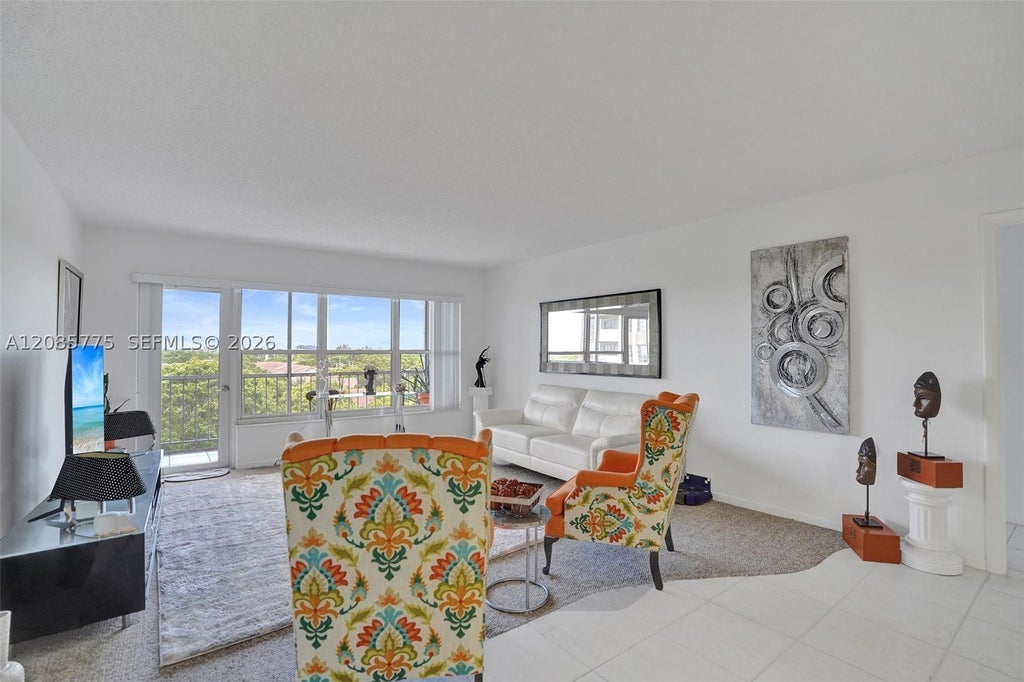 Photo of 10777 W Sample Rd #718, Coral Springs, FL 33065 (MLS # A12085775)