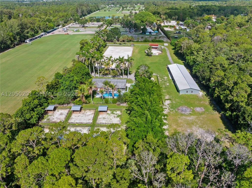 Photo of 1068 D Rd, Loxahatchee, FL 33470 (MLS # A12050201)