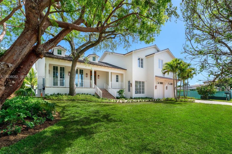 A Yachtsman’s dream home totally new 2025 rebuild sits high on a 12,000 SF direct ocean access lushly landscaped tree-shaded interior lot on a quiet cul de sac street in the highly regarded Gables by the Sea guard-gated community. This New England style 2-story 5 bdrm 4.5 bth home is filled with designer selected finishes and boasts over 6,000 total sq ft  of fine craftsmanship, solid wood flooring, calacatta marble and the most beautiful kitchen ever! Spacious layout, high ceilings and abundant natural light. Direct no-bridge ocean access features 25,000 lb boat lift, 100' seawall, 80' ipe wood dock, 2 full dock towers & pilings, all brand new. Generator-ready. Four-car lift-capable garage. Coral Gables premier ocean access guard-gated community has the best in schools & nearby amenities.