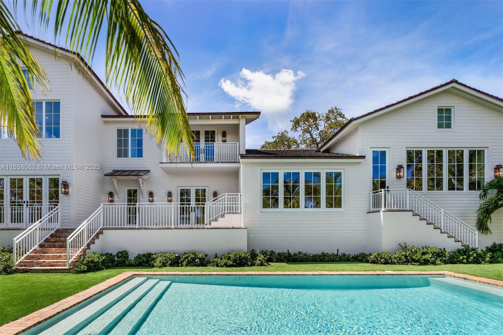 Not a spec home! Custom BRAND NEW 100% gut-rebuild top to bottom 5bd 4.5ba with 1300 SF added, fully permitted & elevated on 12k SF Direct Ocean Access lot. Gorgeous handcrafted cabinetry & natural stone/marble in all baths, kitchen, laundry room & butlers pantries. Spacious layout, high ceilings & lots of light. Solid wide plank white oak solid wood floors & Calacatta marble complete the beautiful interior. Direct water views w/IMMEDIATE NO BRIDGE OCEAN access to Biscayne Bay. BOATERS DREAM COME TRUE w/ALL NEW: 25k lb boat lift, 100' seawall, 80' ipe wood dock, 2 full dock towers & pilings. Lift-capable garage for 4 cars. Generator-ready. 2 propane tanks for cooking. Coral Gables premier ocean access guard-gated community w/top-rated schools, park, pedestrian-friendly tree-lined streets.