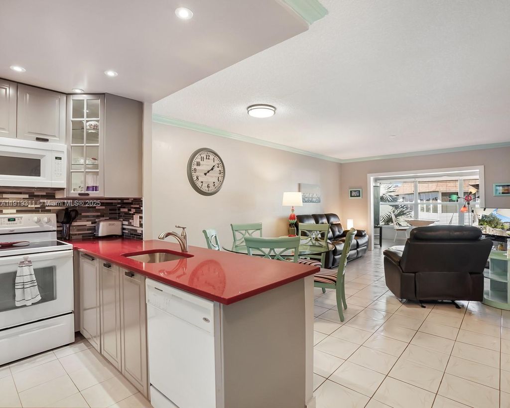 Photo of 4705 NW 35th St #616, Lauderdale Lakes, FL 33319 (MLS # A11919311)