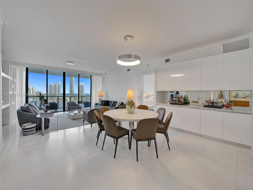 Exquisite, fully furnished, move-in-ready residence located on an exclusive private island, offering breathtaking ocean, Intracoastal, and city skyline views. Enjoy true luxury living with privacy, 24-hour security, and access to an exclusive 8-acre amenity oasis.
This elegant flow-through unit features 3 spacious bedrooms, 4.5 bathrooms, floor-to-ceiling glass windows, and two expansive terraces with stunning marina and ocean views. The residence is beautifully finished with marble floors throughout, a sleek modern European kitchen, and generous walk-in closets.
Residents enjoy world-class amenities, including multiple resort-style pools, tennis courts, poolside bar service, wine and cigar lounge, valet parking, concierge services, and private elevator access.