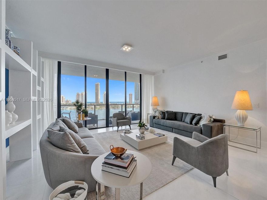 Exquisite, fully furnished, move-in-ready residence located on an exclusive private island, offering breathtaking ocean, Intracoastal, and city skyline views. Enjoy true luxury living with privacy, 24-hour security, and access to an exclusive 8-acre amenity oasis.
This elegant flow-through unit features 3 spacious bedrooms, 4.5 bathrooms, floor-to-ceiling glass windows, and two expansive terraces with stunning marina and ocean views. The residence is beautifully finished with marble floors throughout, a sleek modern European kitchen, and generous walk-in closets.
Residents enjoy world-class amenities, including multiple resort-style pools, tennis courts, poolside bar service, wine and cigar lounge, valet parking, concierge services, and private elevator access.