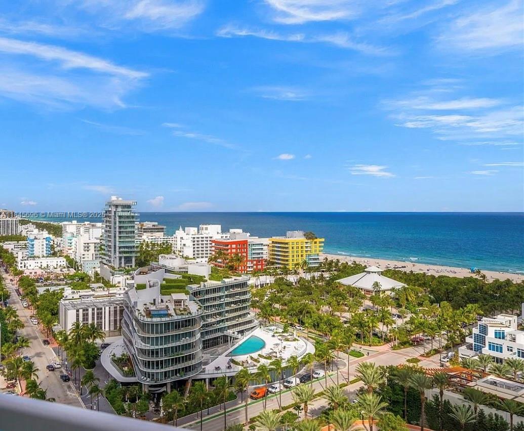 Stunning ocean, bay, and skyline views await from this high-floor 2 bed, 2.5 bath residence at Portofino Tower in the exclusive South of Fifth neighborhood. This corner unit features floor-to-ceiling windows, a spacious wraparound balcony, marble floors, and an open layout perfect for entertaining. The split-bedroom plan includes a generous primary suite with spa-like bath and ample closet space. Enjoy a sleek kitchen with premium appliances, a versatile den/office, and breathtaking vistas from every room. Portofino offers luxury amenities: 29th-floor fitness center, spa, pool, tennis, valet, and 24/7 security—all just steps from the beach, South Pointe Park, and world-class dining.