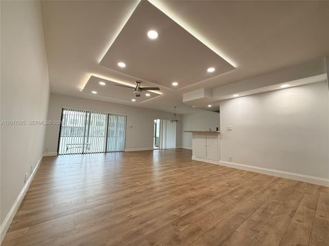 Photo of 9717 N New River Canal Rd #406, Plantation, FL 33324 (MLS # A12017825)