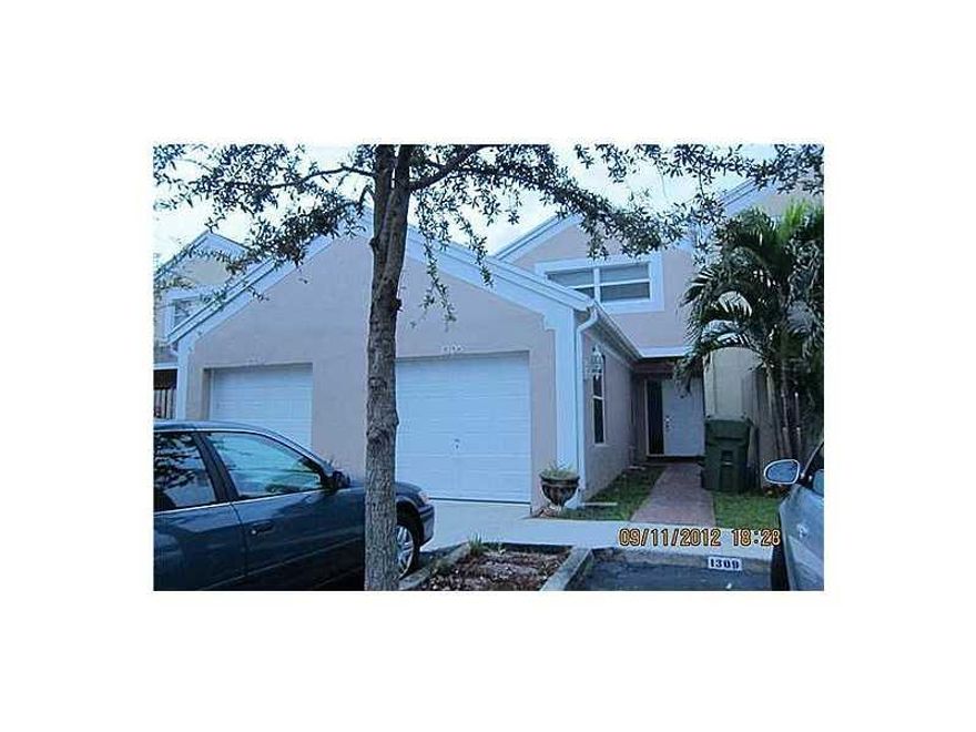 BEAUTIFUL 2/2 TOWNHOUSE WITH BONUS ROOM IN THE HEART OF PEMBROKE PINES, CLOSE TO SHOPPING CENTERS, MALLS, PLACE OF WORSHIP, THIS COMMUNITY BOAST 2 POOLS, STEAM ROOM, SAUNA, JACUZZI, RACQUET BALL, TENNIS COURT, KIDDIE PLAYGROUND