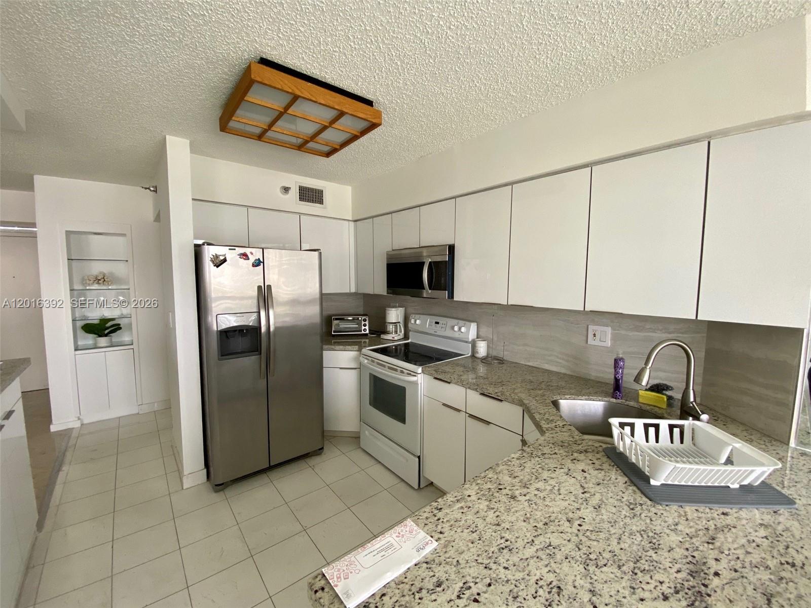 MYSTIC POINTE CONDO NO TH - Residential Lease