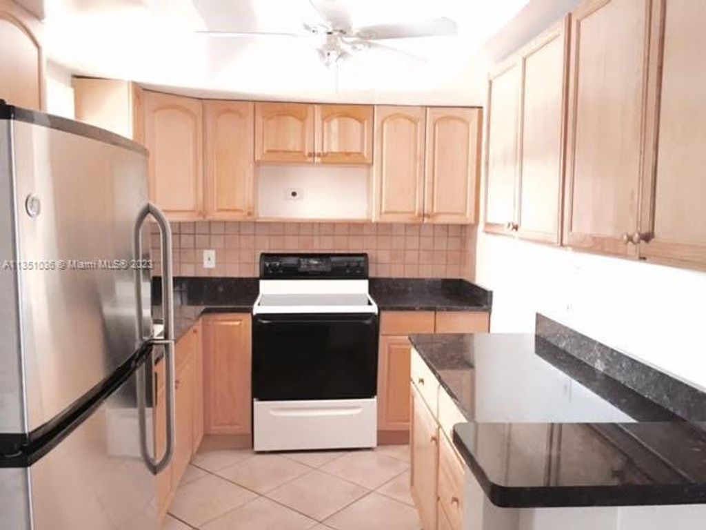 Photo of 236 Castlewood Dr #104, North Palm Beach, FL 33408 (MLS # A11351036)